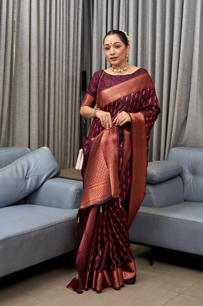 Intricate Wine Soft Silk Saree With Dazzling Blouse Piece