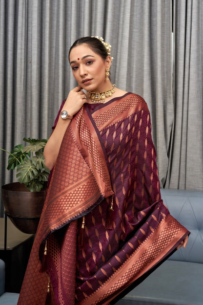 Intricate Wine Soft Silk Saree With Dazzling Blouse Piece
