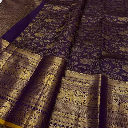 Engaging Purple Pure Zari Weaving Banarasi Silk Saree With Beauteous Blouse Piece