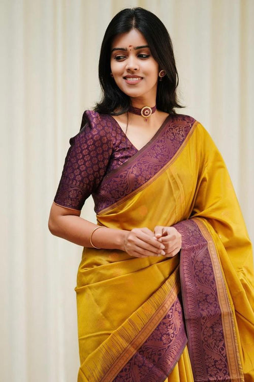 Load image into Gallery viewer, Mesmerising Yellow Soft Silk Saree With Demanding Blouse Piece
