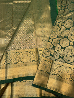 Ideal Dark Green Pure Banarasi Silk Saree With Mellifluous Blouse Piece