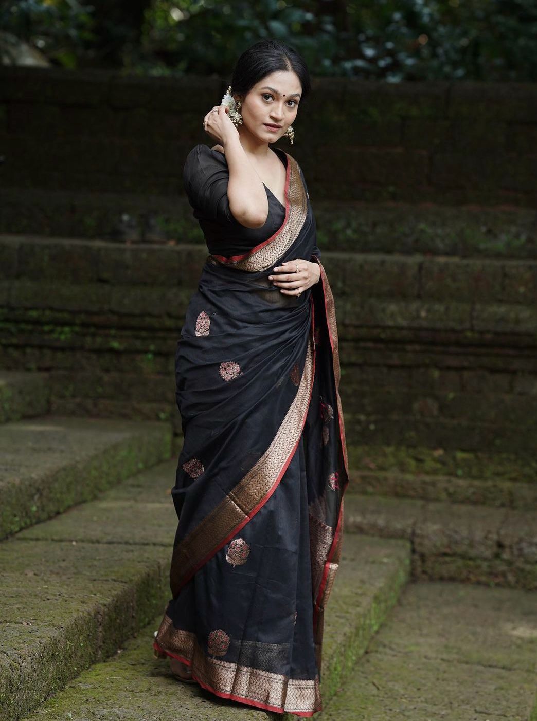 Surpassing Black Soft Silk Saree With Embellished Blouse Piece