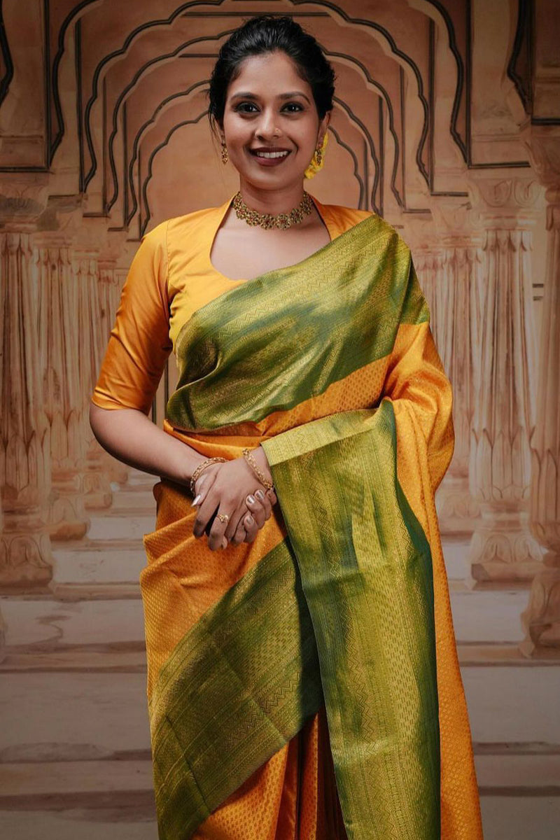 Classy Yellow Soft Silk Saree With Engrossing Blouse Piece