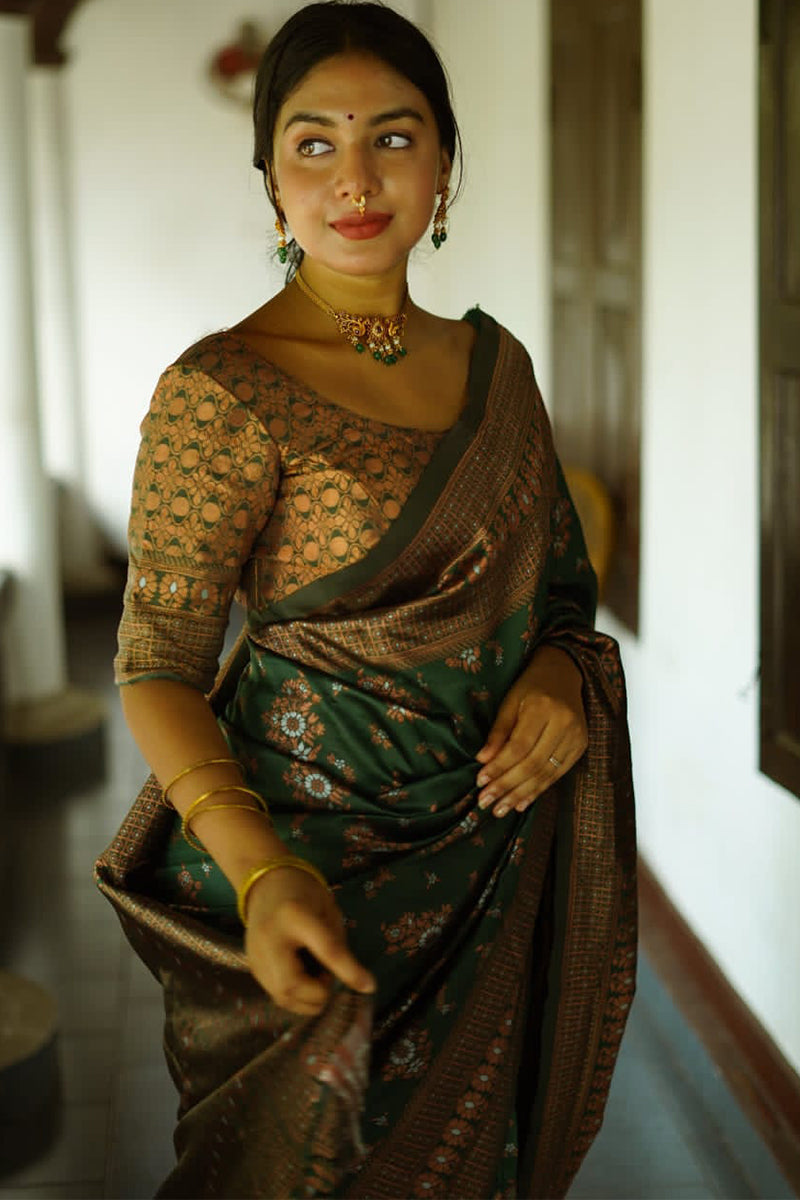 Captivating Green Soft Silk Saree With Twirling Blouse Piece