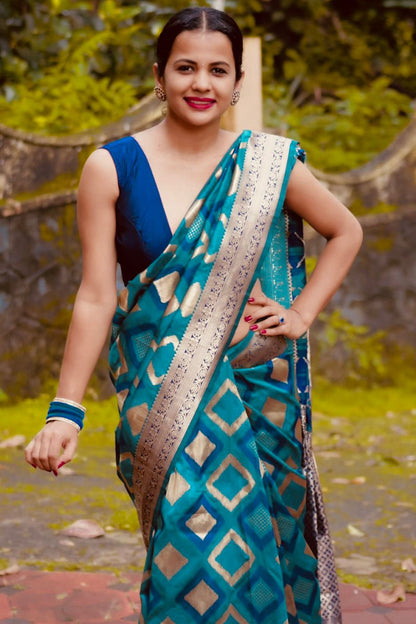 Majestic Firozi Soft Silk Saree With Aplomb Blouse Piece