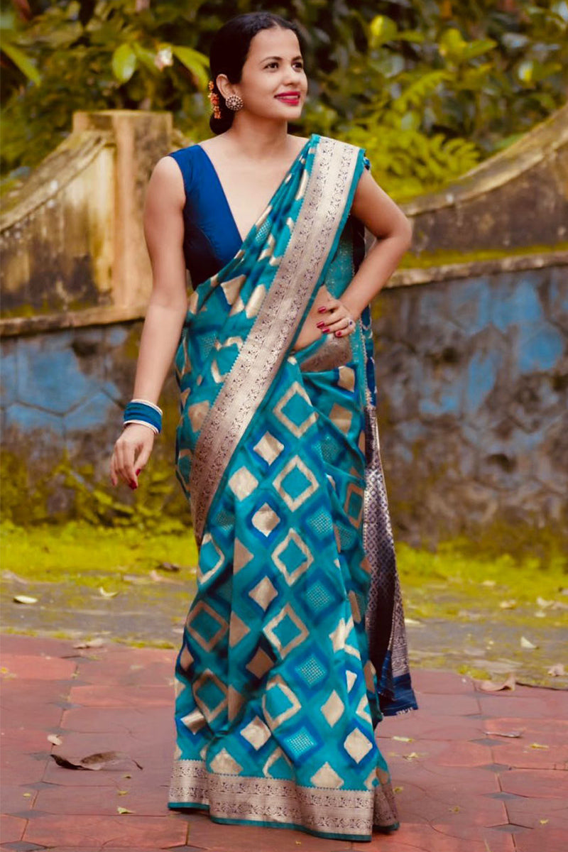Majestic Firozi Soft Silk Saree With Aplomb Blouse Piece