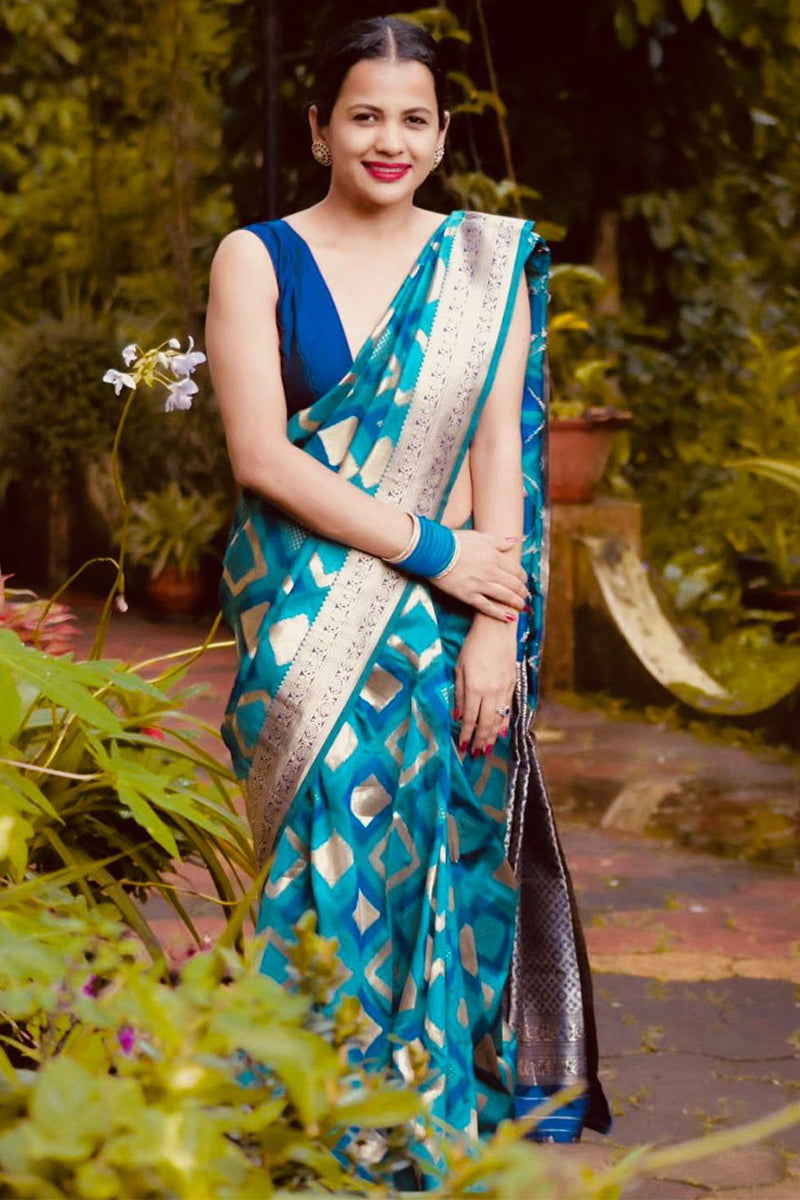 Majestic Firozi Soft Silk Saree With Aplomb Blouse Piece