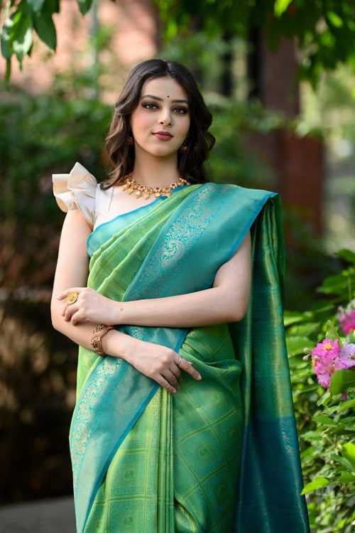 Load image into Gallery viewer, Artistic Sea Green Soft Banarasi Silk Saree With Proficient Blouse Piece
