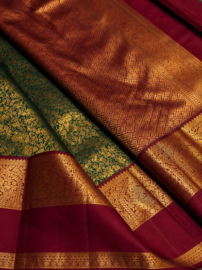 Artistic Dark Green Pure Zari Weaving Banarasi Silk Saree With Dazzling Blouse Piece