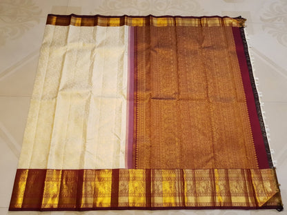 Cynosure Beige Pure Banarasi Silk Saree With Zephyr Blouse Piece