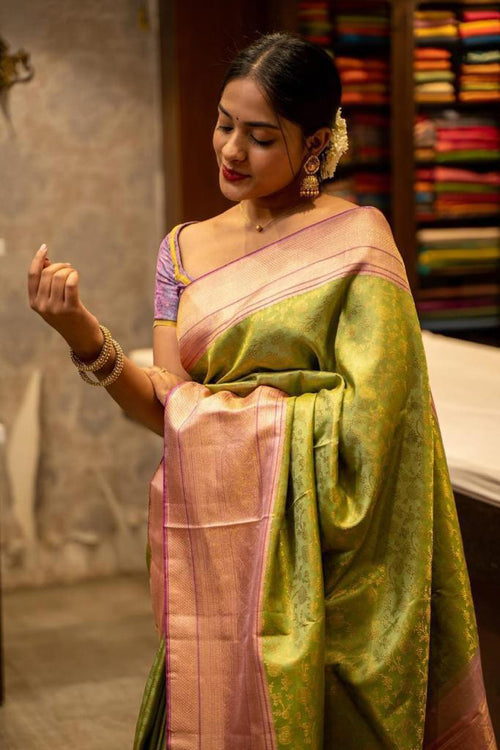 Load image into Gallery viewer, Ailurophile Mehandi Soft Silk Saree With Blissful Blouse Piece
