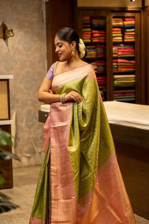 Load image into Gallery viewer, Ailurophile Mehandi Soft Silk Saree With Blissful Blouse Piece
