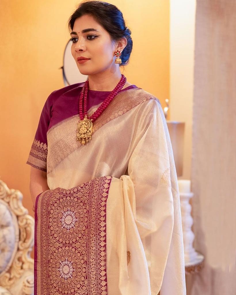Demanding Beige Soft Banarasi Silk Saree With Adorable Blouse Piece