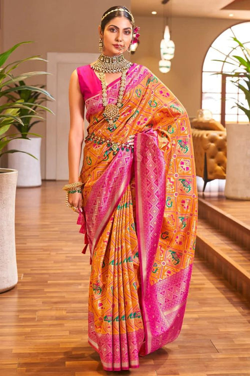 Load image into Gallery viewer, Lovely Orange Patola Silk Saree with Sensational Blouse Piece
