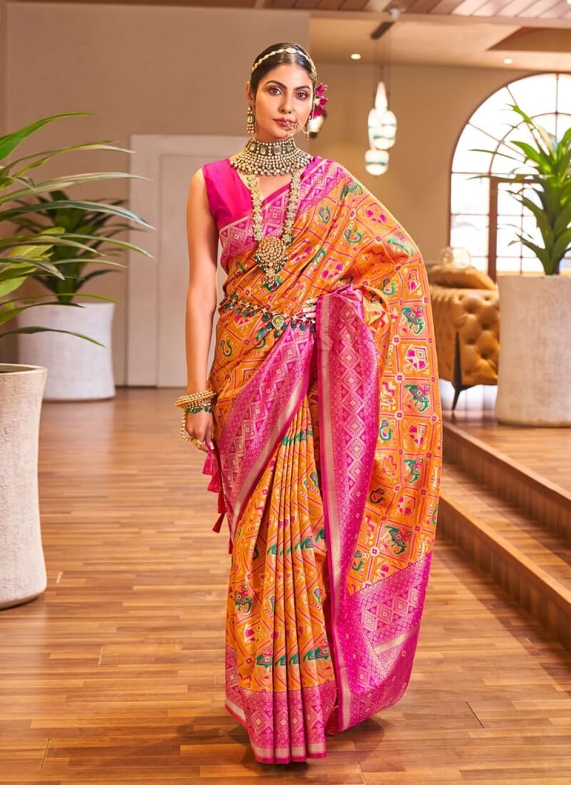 Lovely Orange Patola Silk Saree with Sensational Blouse Piece