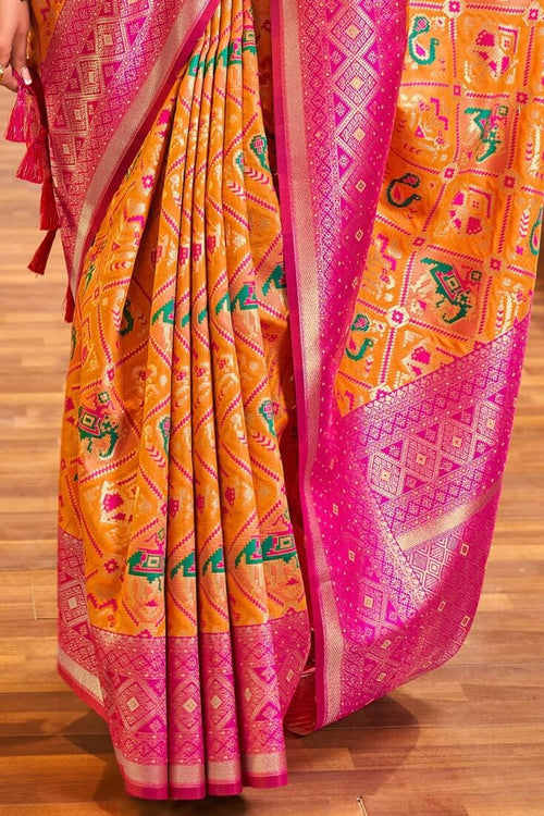 Load image into Gallery viewer, Lovely Orange Patola Silk Saree with Sensational Blouse Piece
