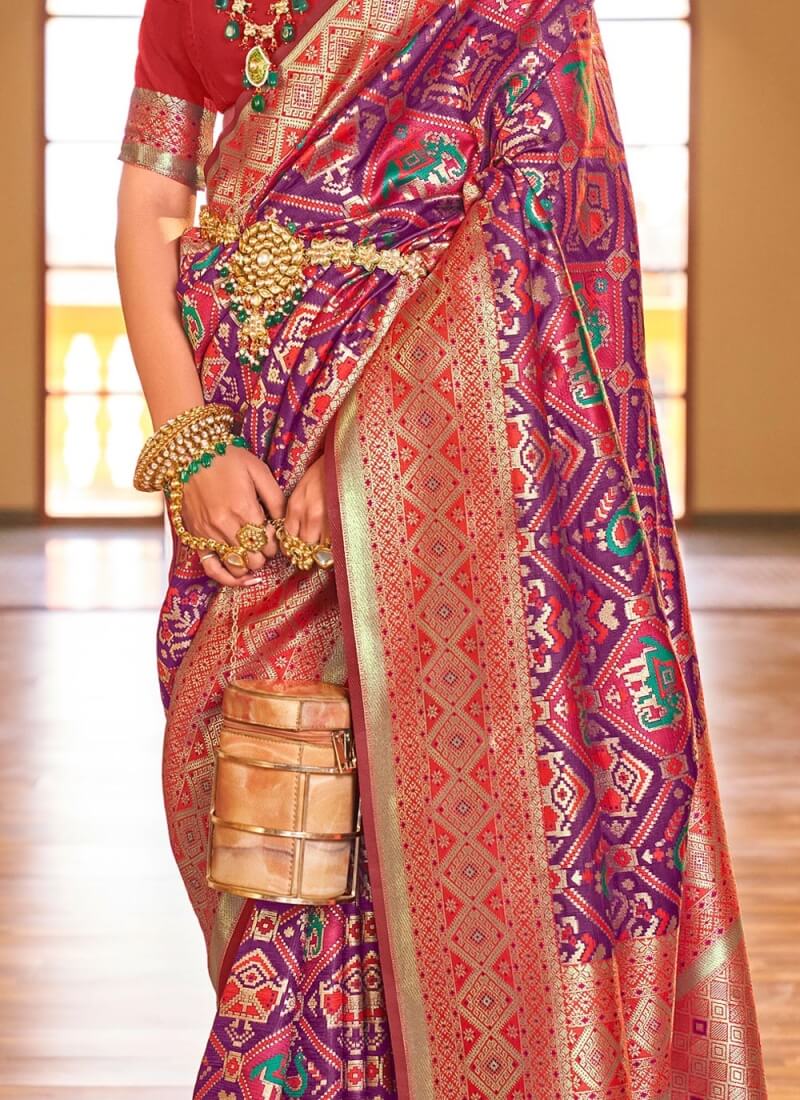 Demanding Purple Patola Silk Saree with Desiring Blouse Piece