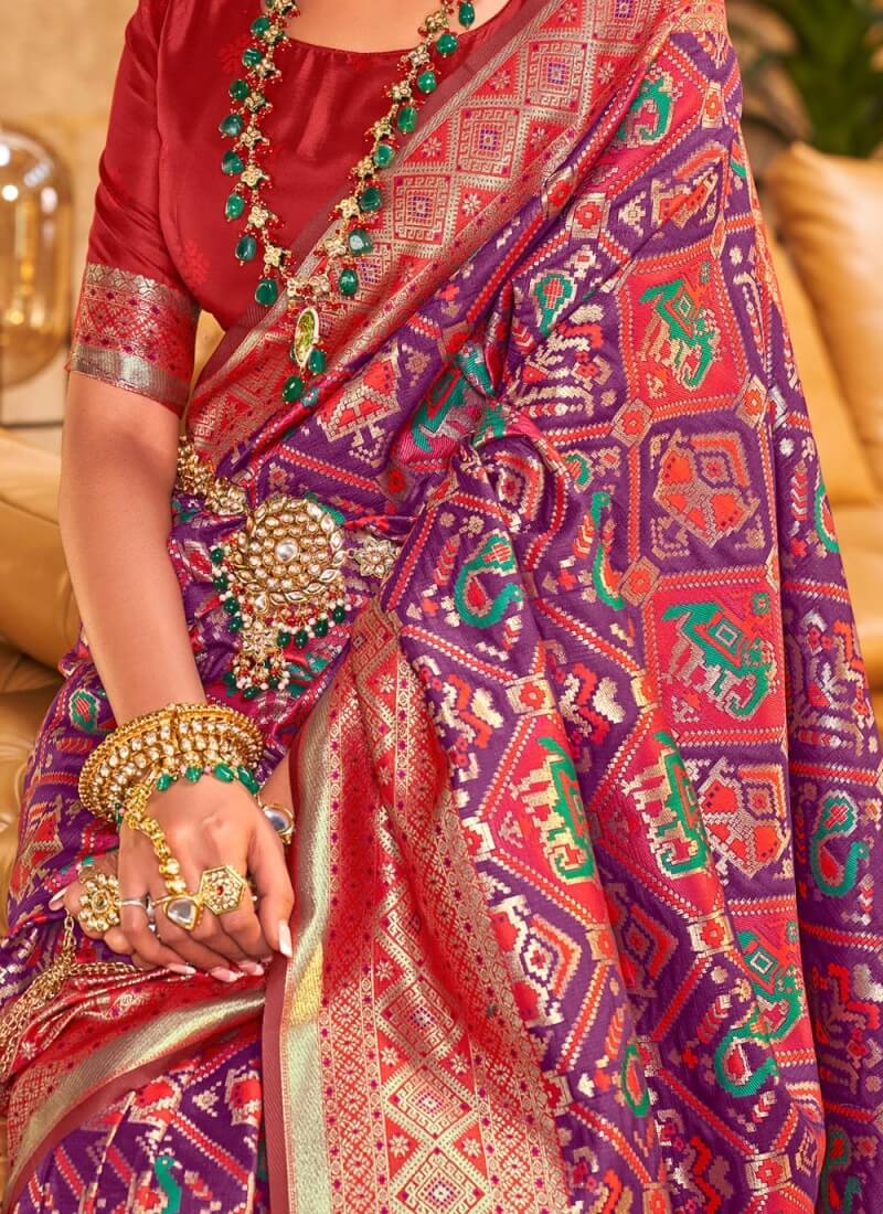 Demanding Purple Patola Silk Saree with Desiring Blouse Piece