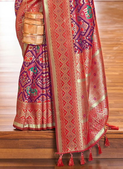 Demanding Purple Patola Silk Saree with Desiring Blouse Piece