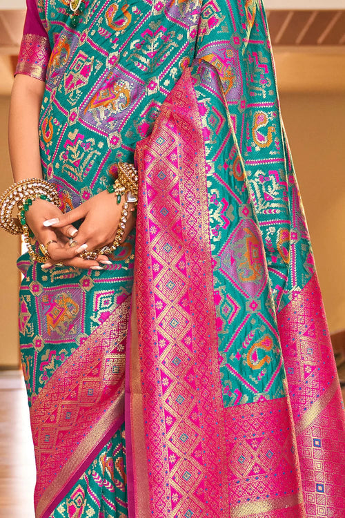 Load image into Gallery viewer, Outstanding Turquoise Patola Silk Saree with Invaluable Blouse Piece
