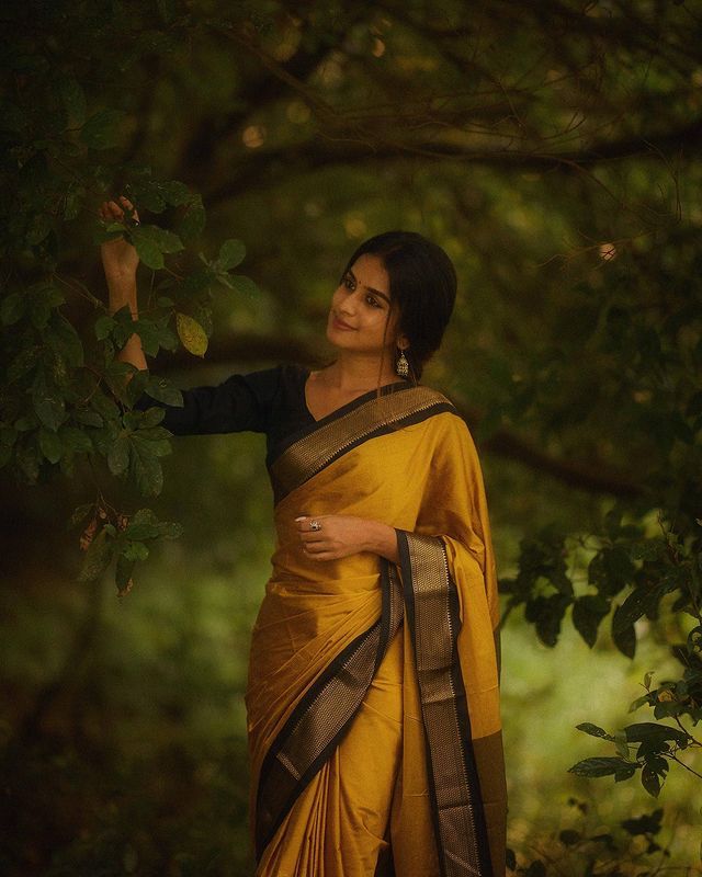 Lovely Yellow Soft Banarasi Silk Saree With Gleaming Blouse Piece