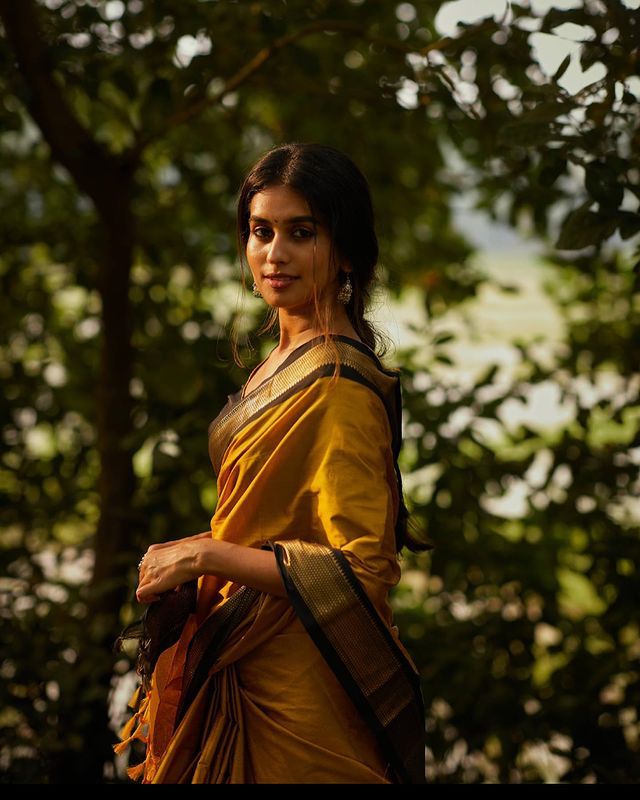 Lovely Yellow Soft Banarasi Silk Saree With Gleaming Blouse Piece