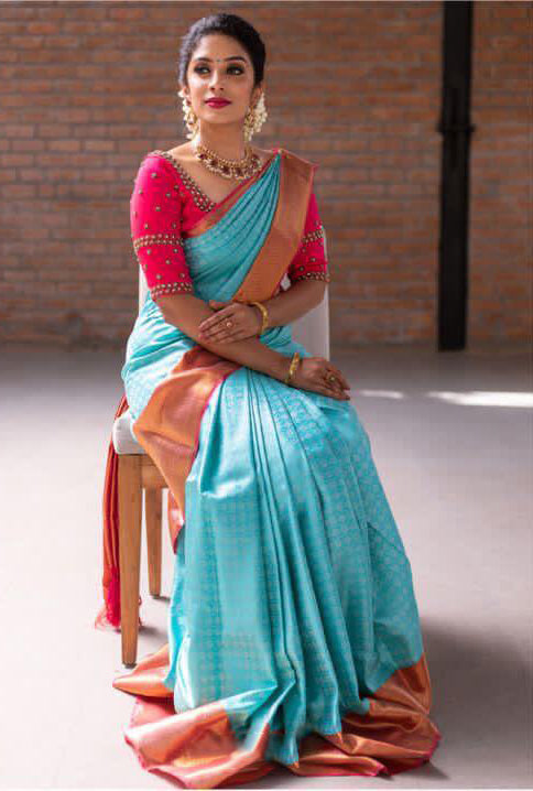 Load image into Gallery viewer, Gorgeous Firozi Soft Silk Saree With Flattering Blouse Piece
