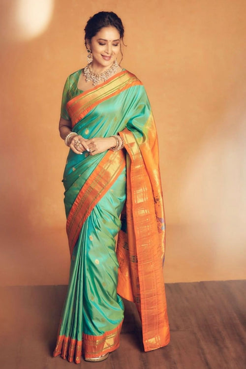 Load image into Gallery viewer, Exuberant Firozi Soft Silk Saree With Surreptitious Blouse Piece
