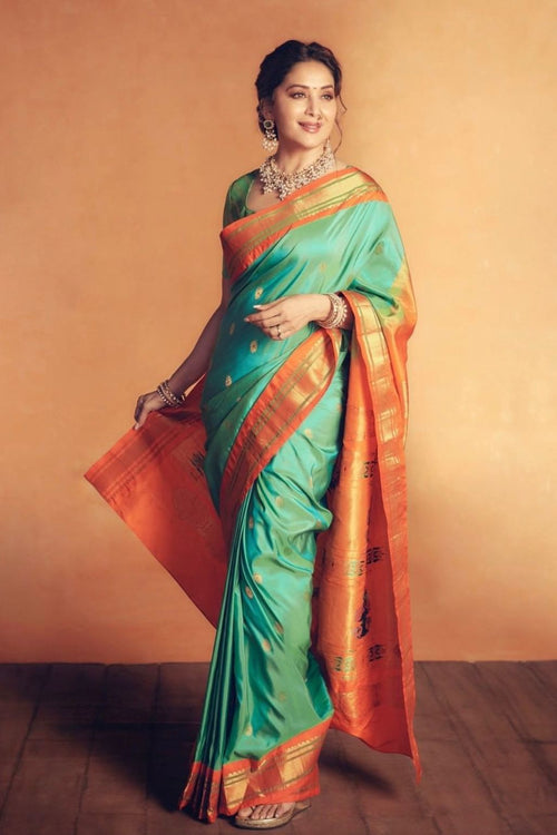 Load image into Gallery viewer, Exuberant Firozi Soft Silk Saree With Surreptitious Blouse Piece
