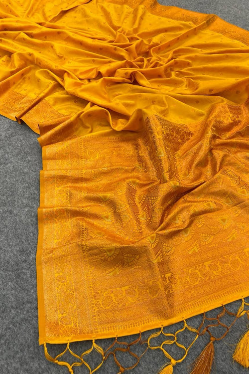 Load image into Gallery viewer, Divine Yellow Soft Banarasi Silk Saree With Ephemeral Blouse Piece
