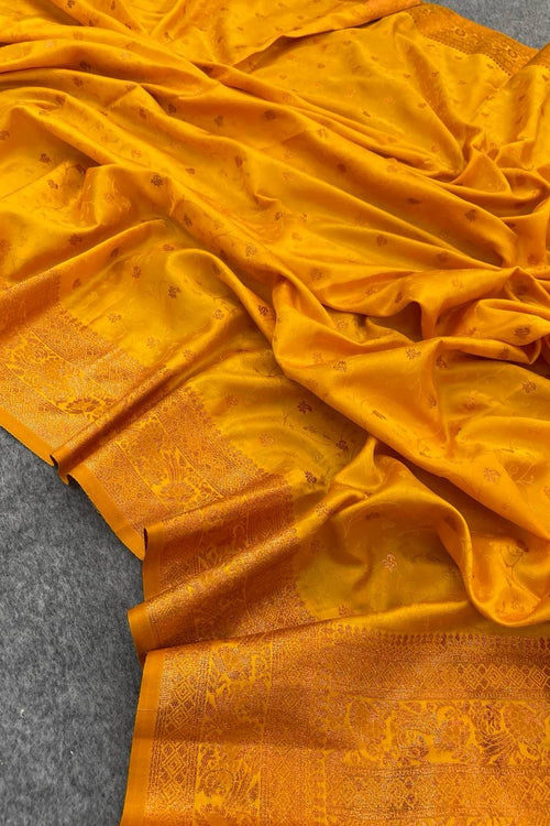 Load image into Gallery viewer, Divine Yellow Soft Banarasi Silk Saree With Ephemeral Blouse Piece
