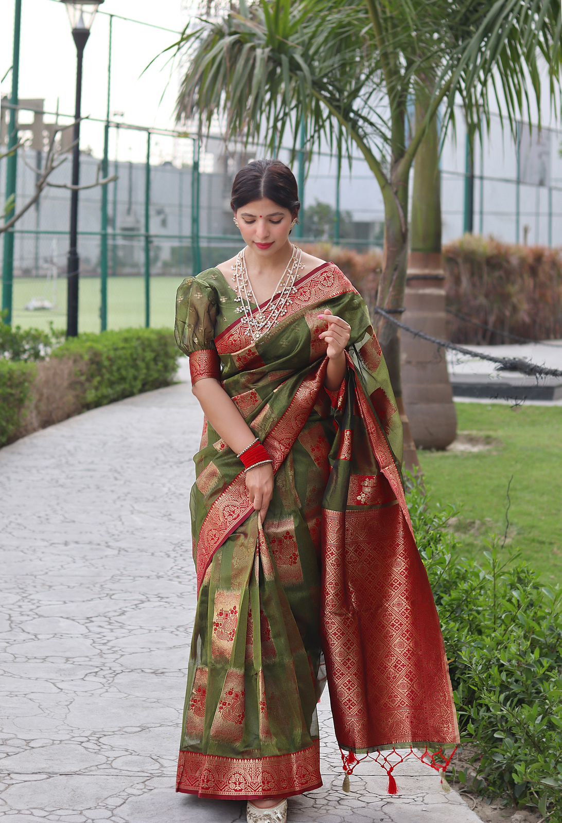 Gleaming Green Orgenza Silk Saree with Classy Blouse Piece