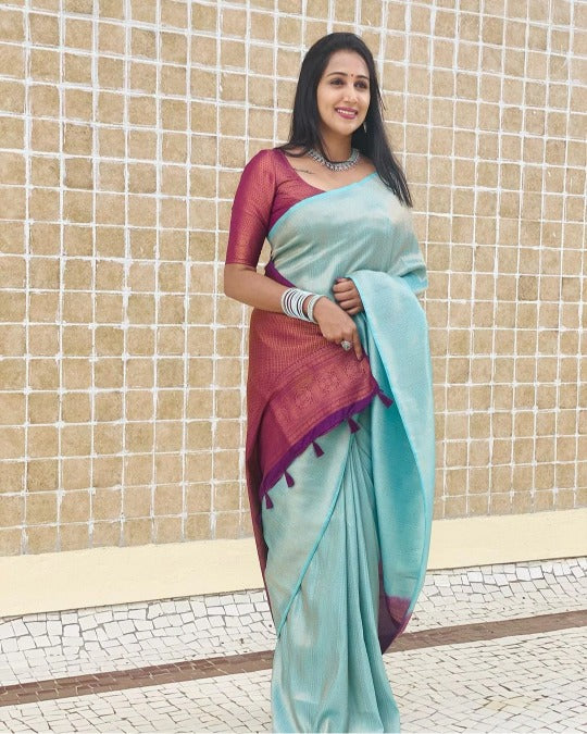 Dazzling Firozi Soft Silk Saree with Unique Blouse Piece