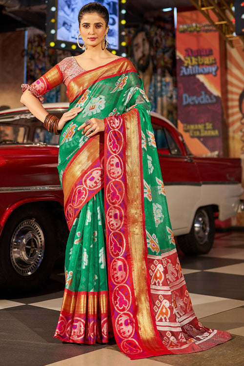 Load image into Gallery viewer, Invaluable Green Patola Silk Saree with Arresting Blouse Piece
