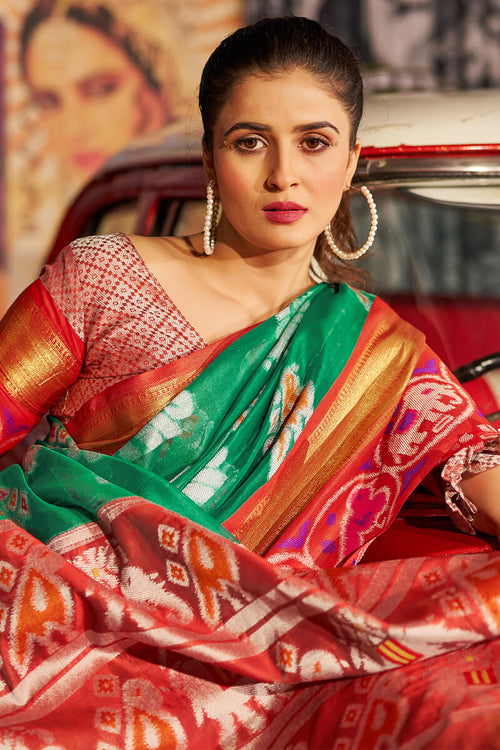 Load image into Gallery viewer, Invaluable Green Patola Silk Saree with Arresting Blouse Piece
