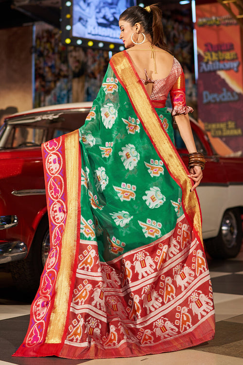 Load image into Gallery viewer, Invaluable Green Patola Silk Saree with Arresting Blouse Piece
