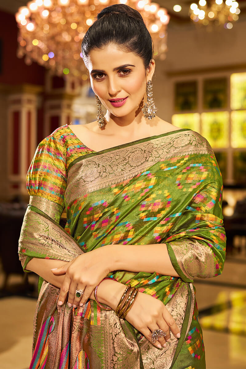 Entrancing Mehndi Organza Silk Saree With Sonorous Blouse Piece