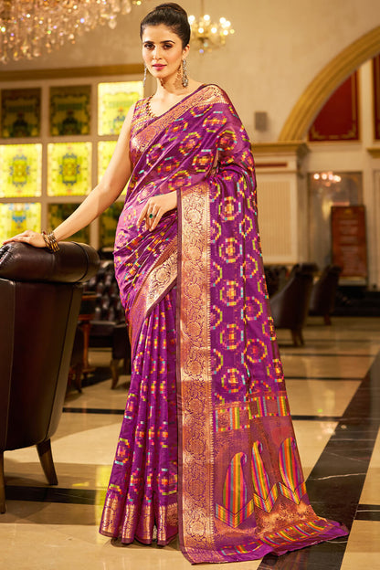 Cynosure Purple Organza Silk Saree With Engaging Blouse Piece