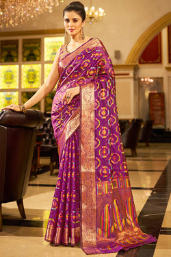 Cynosure Purple Organza Silk Saree With Engaging Blouse Piece