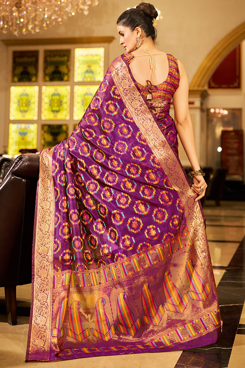 Cynosure Purple Organza Silk Saree With Engaging Blouse Piece
