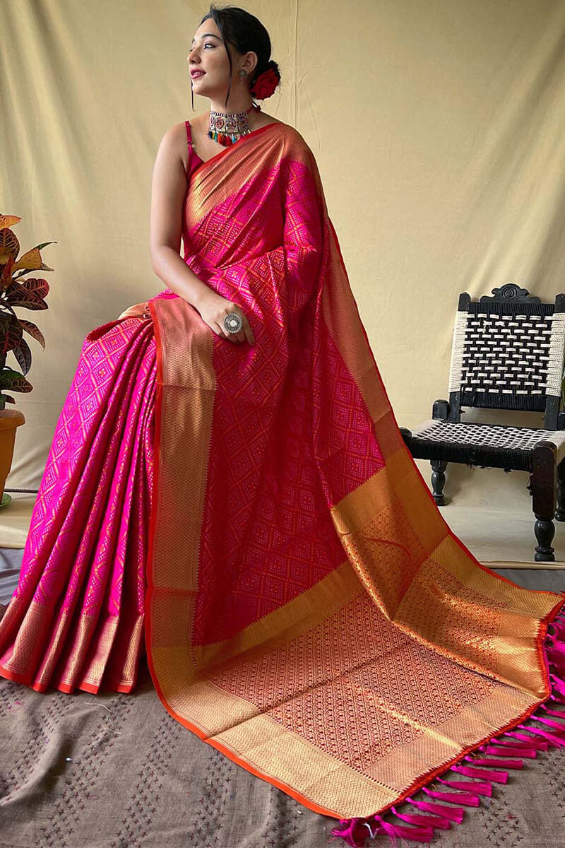 Fancifull Dark Pink Patola Silk Saree with Pretty Blouse Piece