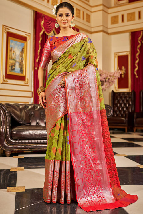 Load image into Gallery viewer, Entrancing Mehndi Soft Banarasi Silk Saree With Demesne Blouse Piece
