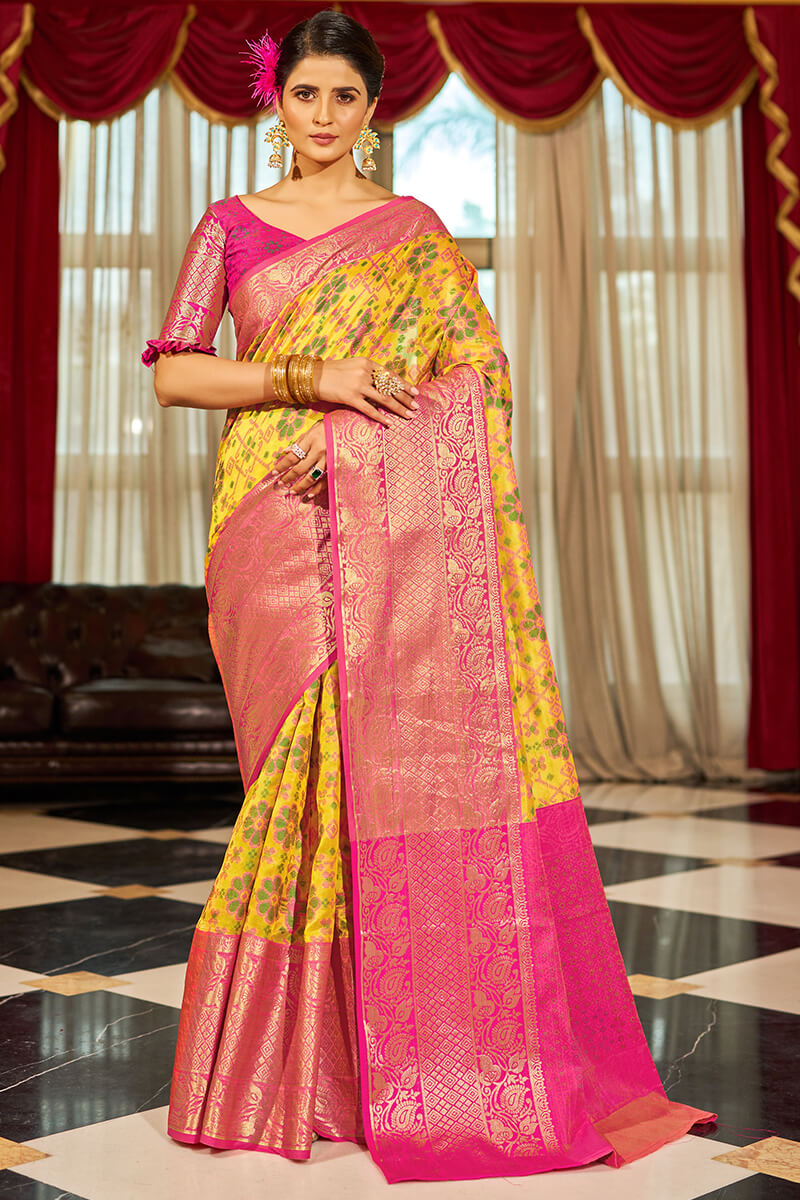 Fugacious Yellow Patola Silk Saree with Dalliance Blouse Piece