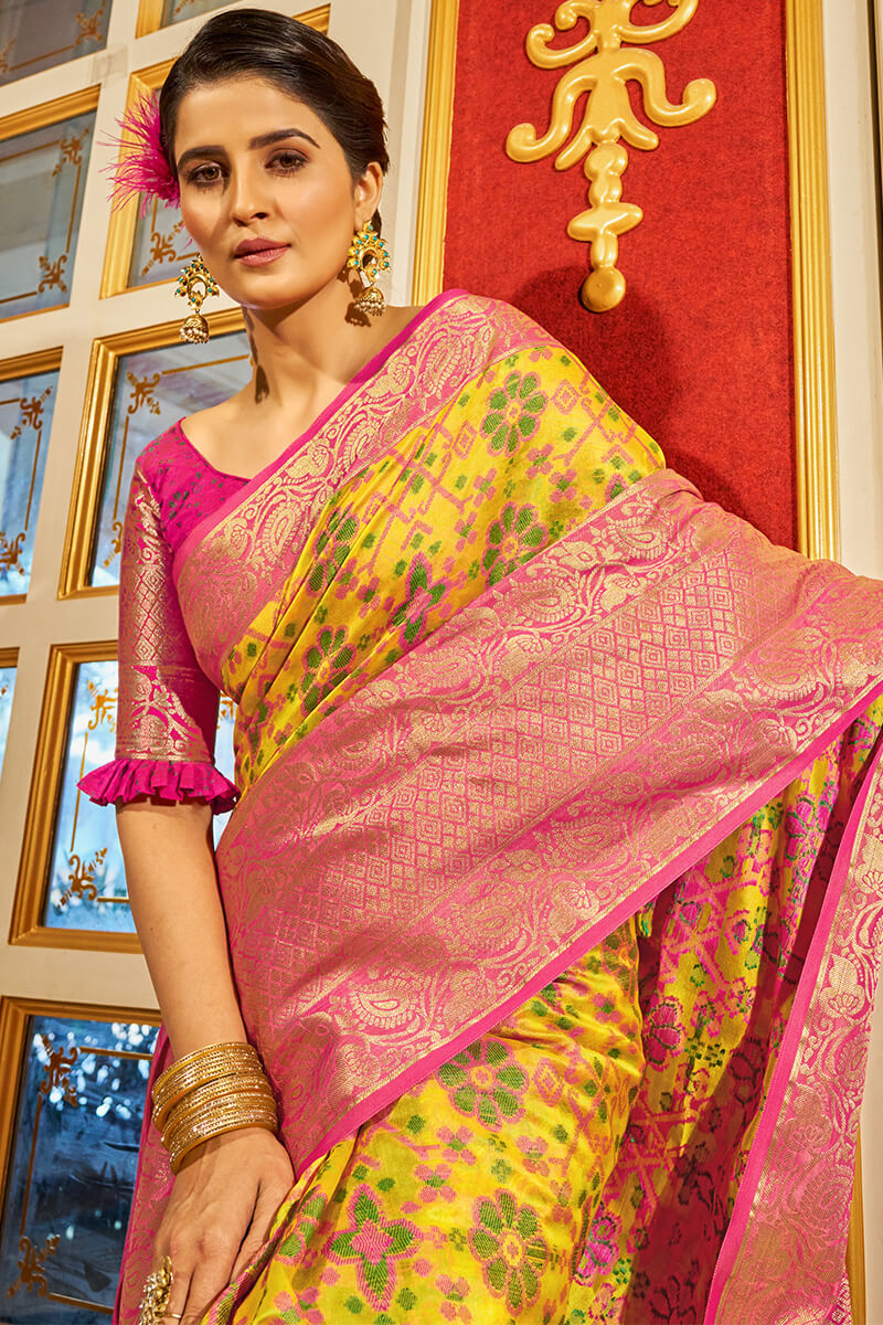 Fugacious Yellow Patola Silk Saree with Dalliance Blouse Piece