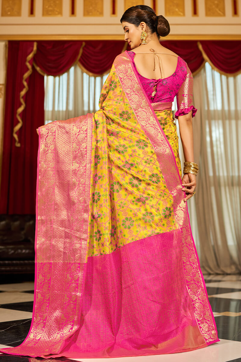 Fugacious Yellow Patola Silk Saree with Dalliance Blouse Piece