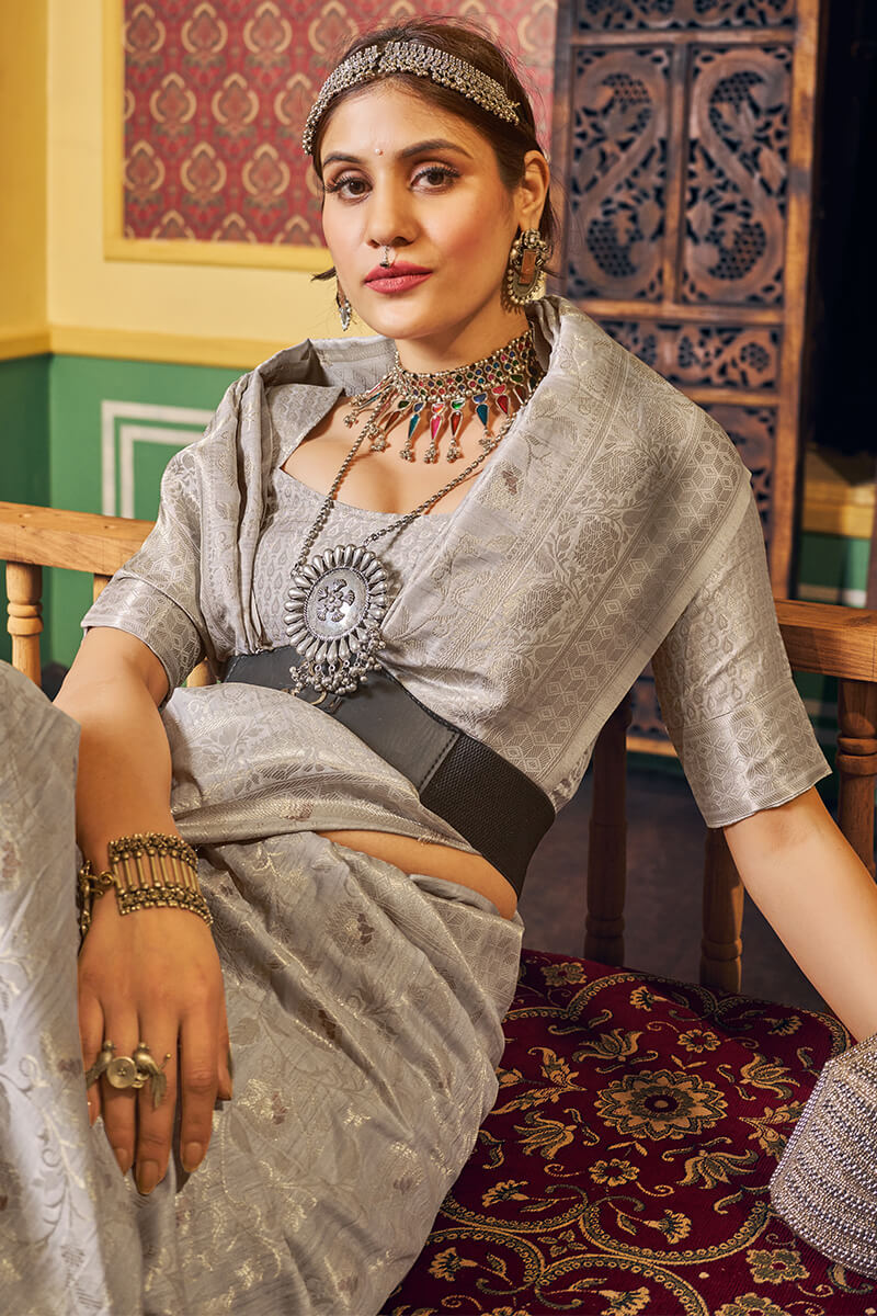 Ravishing Grey Soft Banarasi Silk Saree With Grandiose Blouse Piece