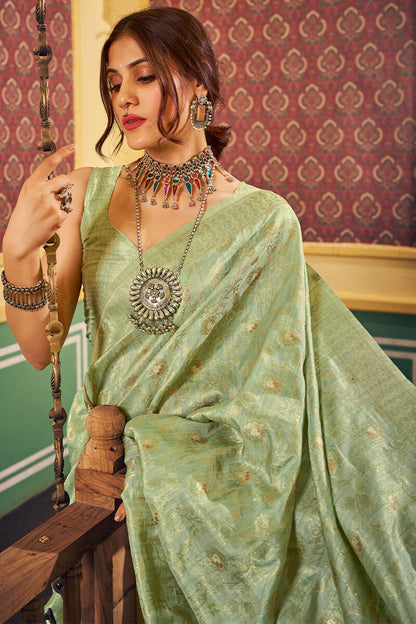 Magnetic Pista Soft Banarasi Silk Saree With Propinquity Blouse Piece