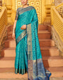 Mesmerising Firozi Patola Silk Saree with Precious Blouse Piece