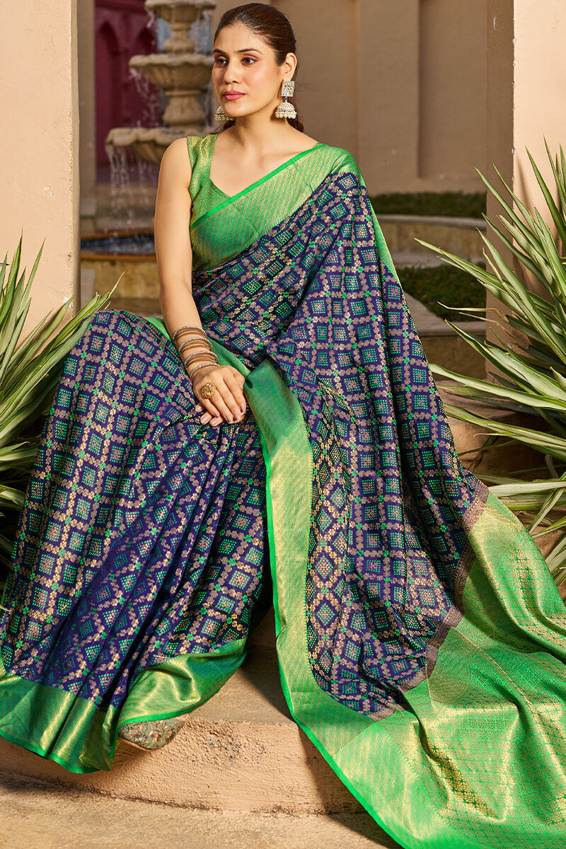 Classy Navy Blue Patola Silk Saree with Marvellous Blouse Piece