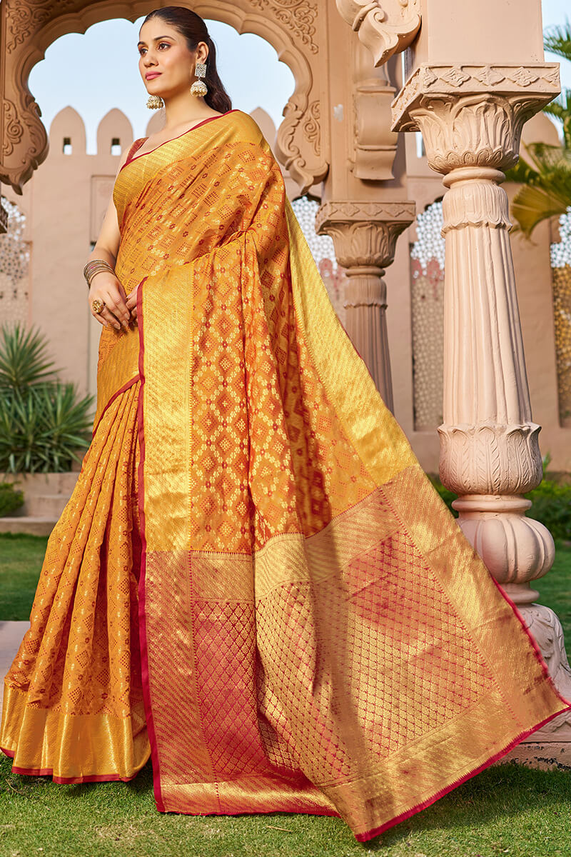 Unique Orange Patola Silk Saree with Appealing Blouse Piece